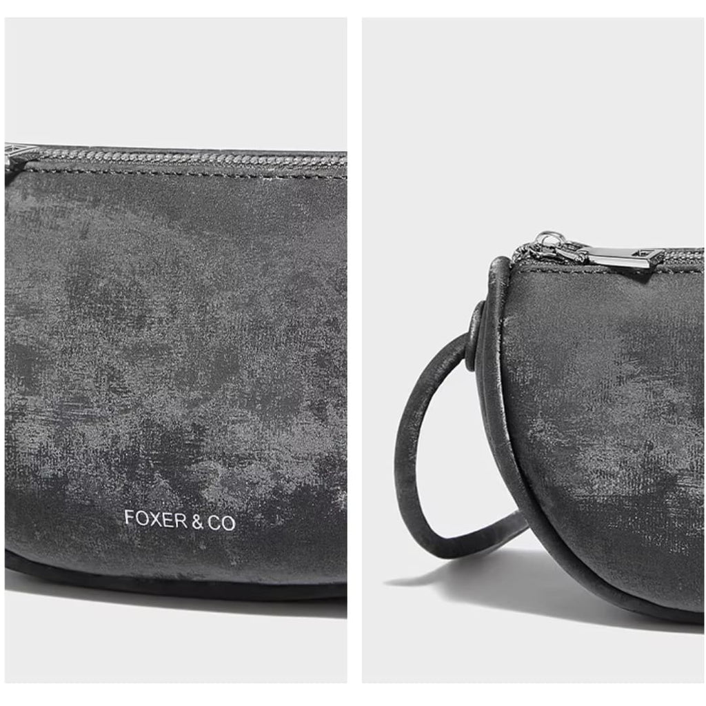 Detalhe do couro refinado da bolsa feminina FOXER Vérena