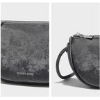 Detalhe do couro refinado da bolsa feminina FOXER Vérena